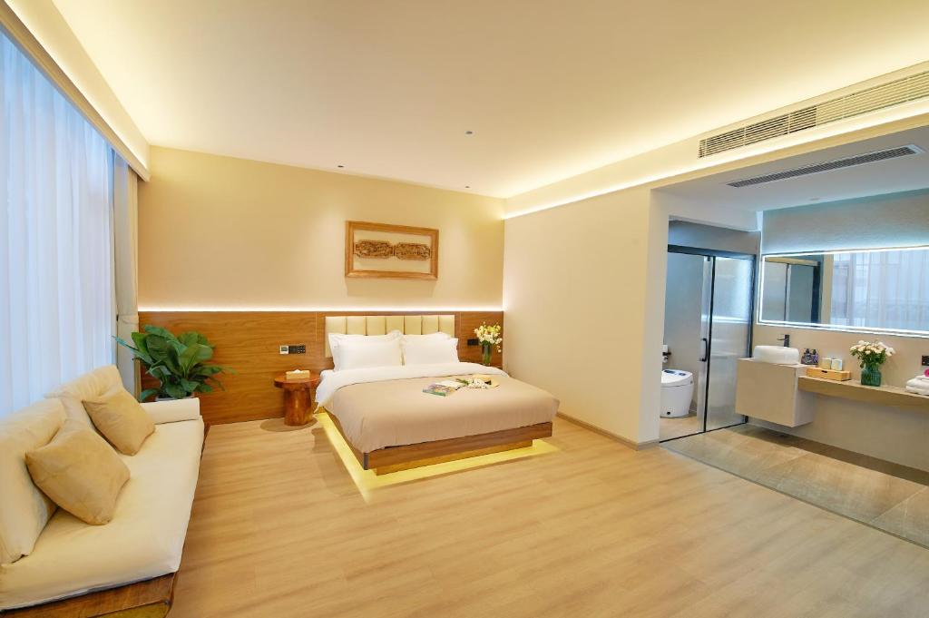 Postel nebo postele na pokoji v ubytování 夕露小榭南门机场大巴店Xiluxiaoxie MUXIN INN