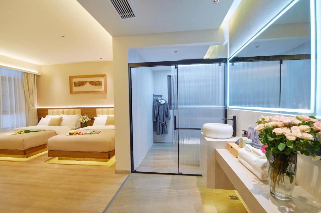 Postel nebo postele na pokoji v ubytování 夕露小榭南门机场大巴店Xiluxiaoxie MUXIN INN