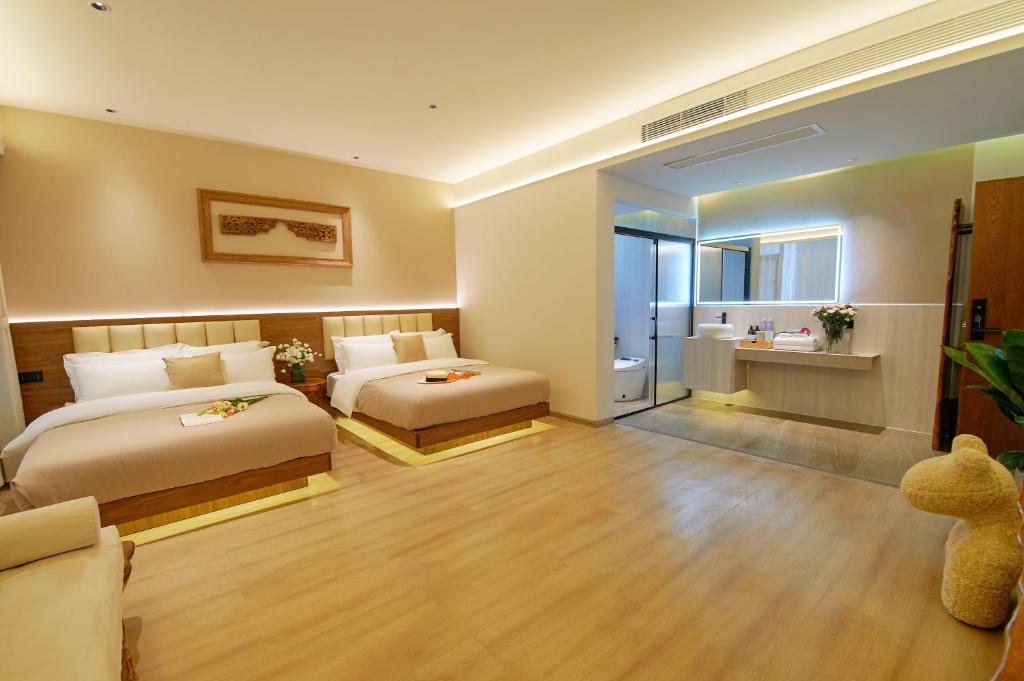 Postel nebo postele na pokoji v ubytování 夕露小榭南门机场大巴店Xiluxiaoxie MUXIN INN