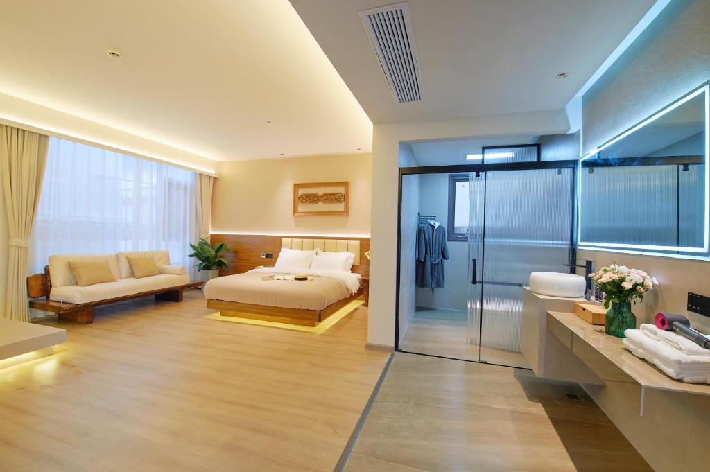 Postel nebo postele na pokoji v ubytování 夕露小榭南门机场大巴店Xiluxiaoxie MUXIN INN