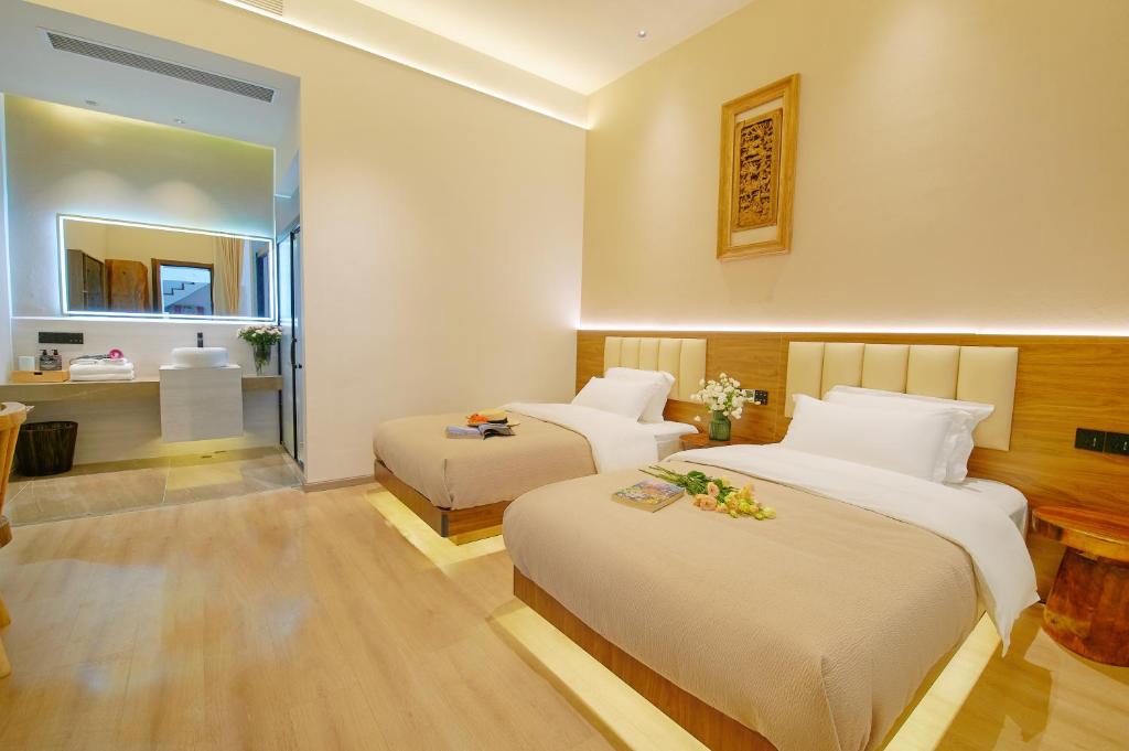 Postel nebo postele na pokoji v ubytování 夕露小榭南门机场大巴店Xiluxiaoxie MUXIN INN