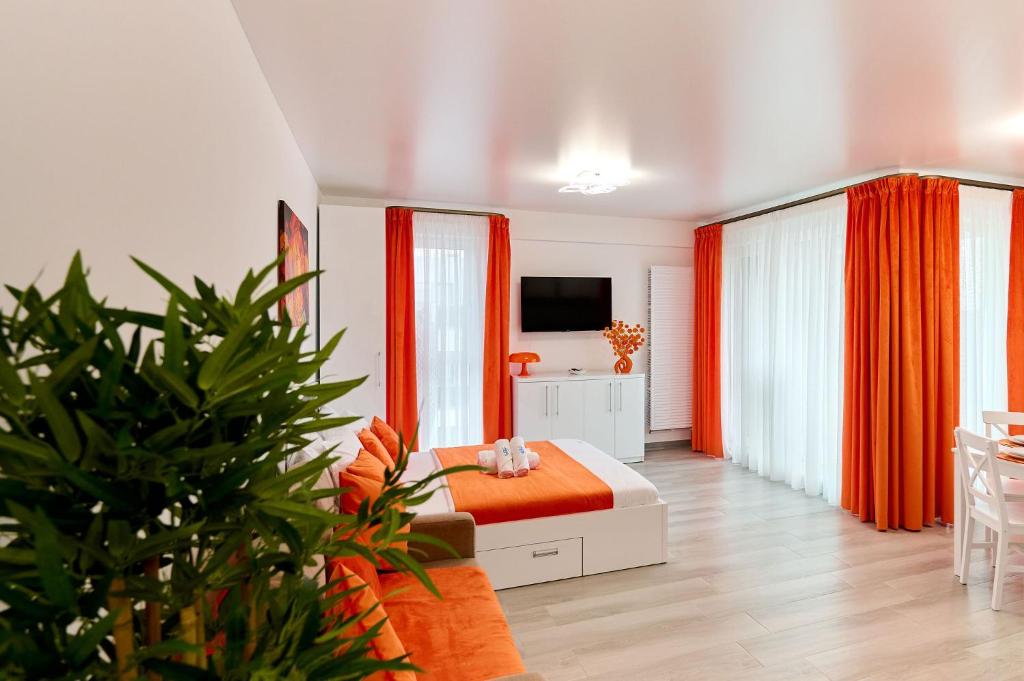 Et tv og/eller underholdning på Dazzling Sunset Studio in Nord10 Pool Resort