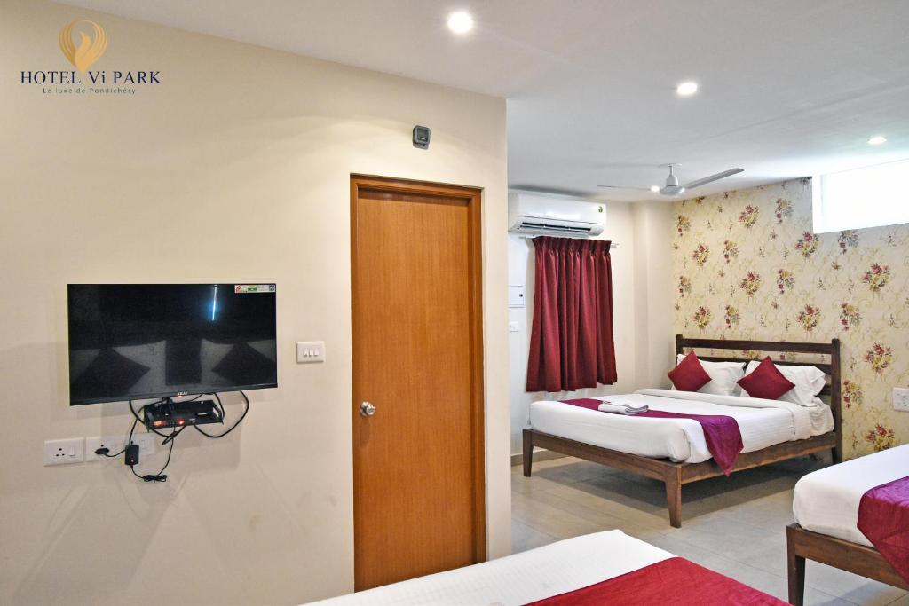 TV a/nebo společenská místnost v ubytování Hotel Vi Park - City Centre