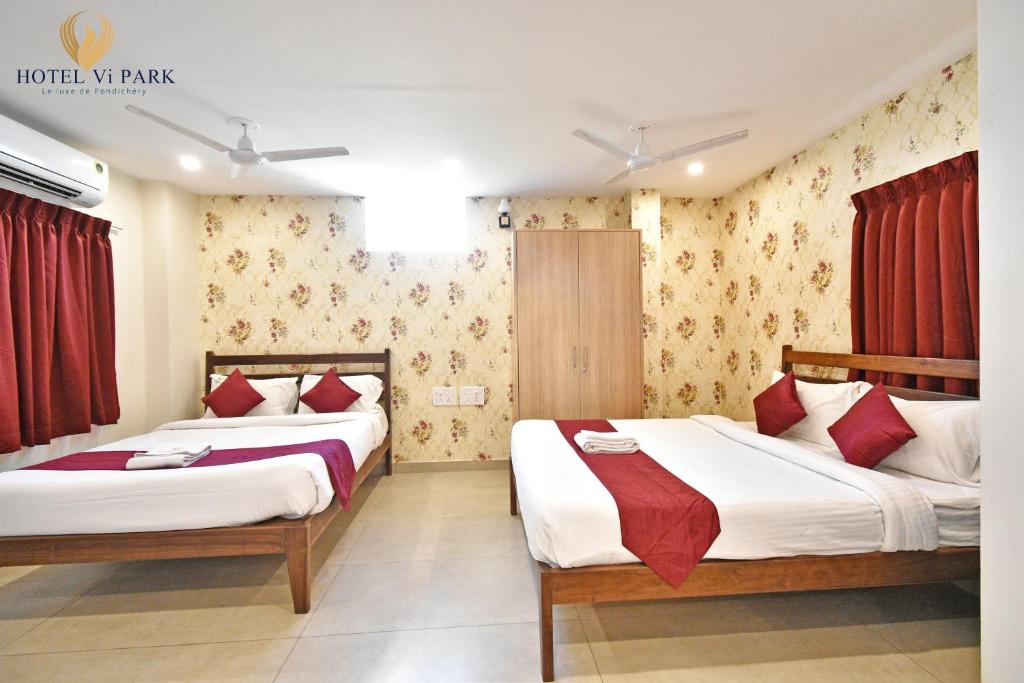 Postel nebo postele na pokoji v ubytování Hotel Vi Park - City Centre