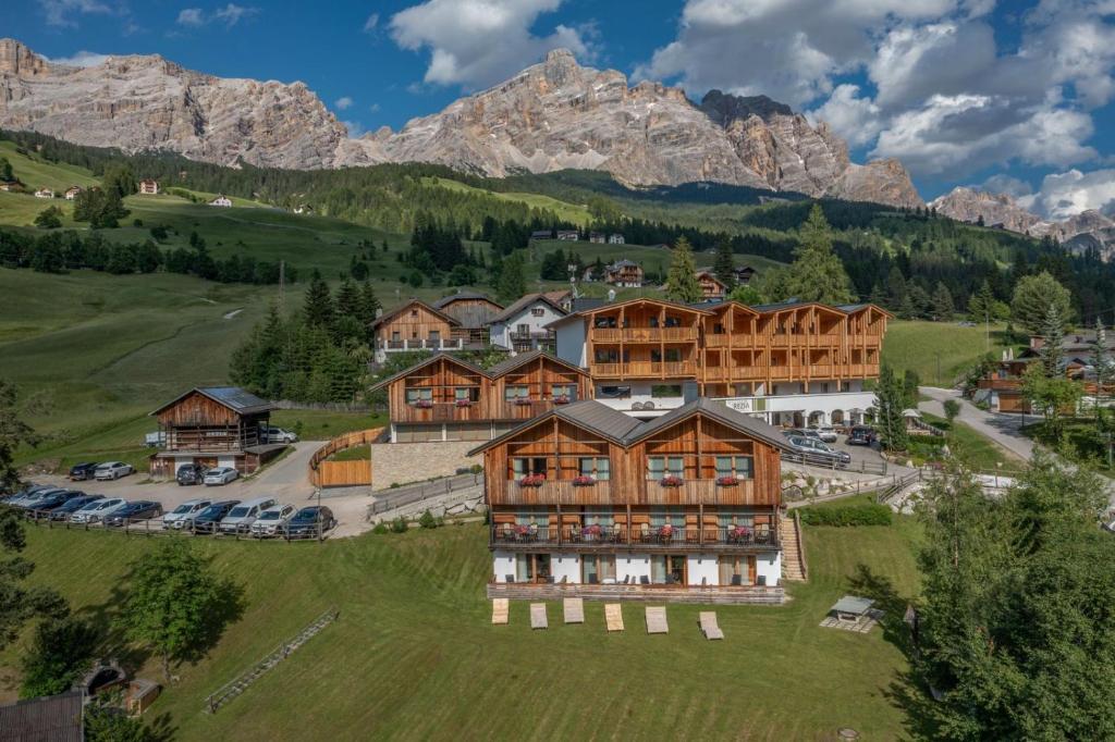an aerial view of a resort in the mountains at Hotel Rezia in La Villa