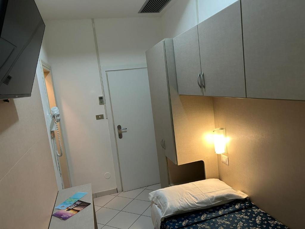 Postel nebo postele na pokoji v ubytování Hotel Sissi