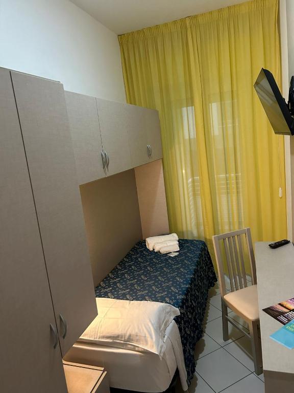 Postel nebo postele na pokoji v ubytování Hotel Sissi