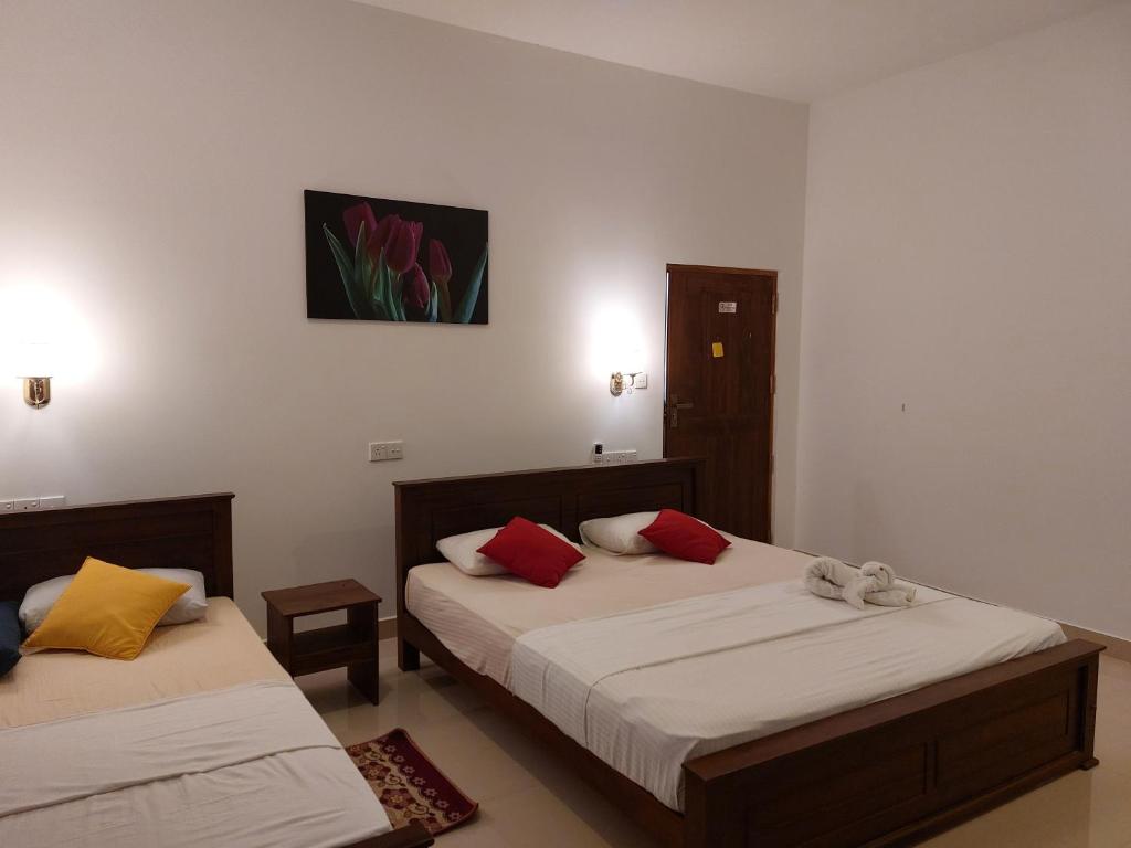 Postel nebo postele na pokoji v ubytování Centurion Resort