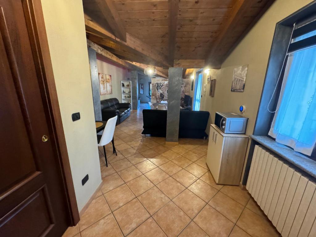 Kuchyň nebo kuchyňský kout v ubytování Stea monolocale loft in villa