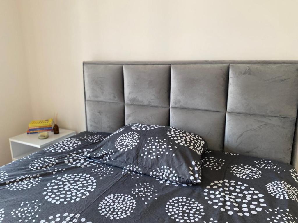 Postel nebo postele na pokoji v ubytování Central Loft