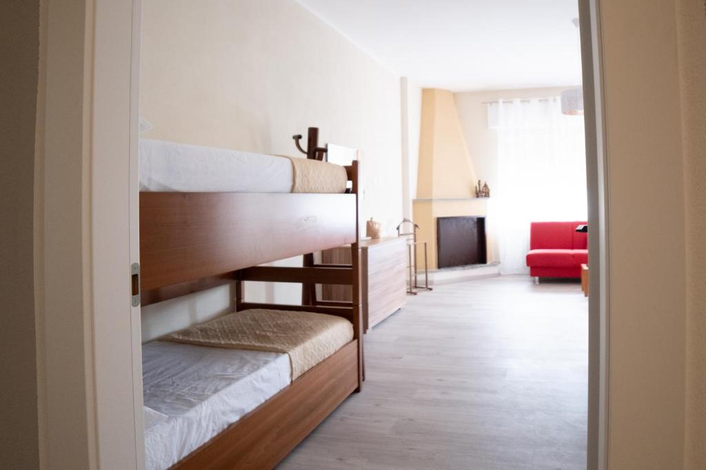 Postel nebo postele na pokoji v ubytování Casa vacanze Aria