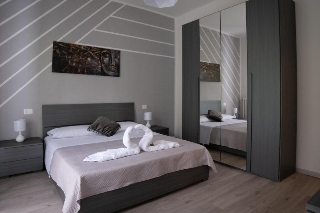 Postel nebo postele na pokoji v ubytování Casa vacanze Aria