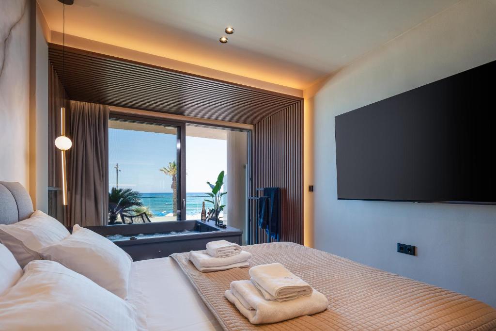 Posteľ alebo postele v izbe v ubytovaní La Vie En Mer Apartments