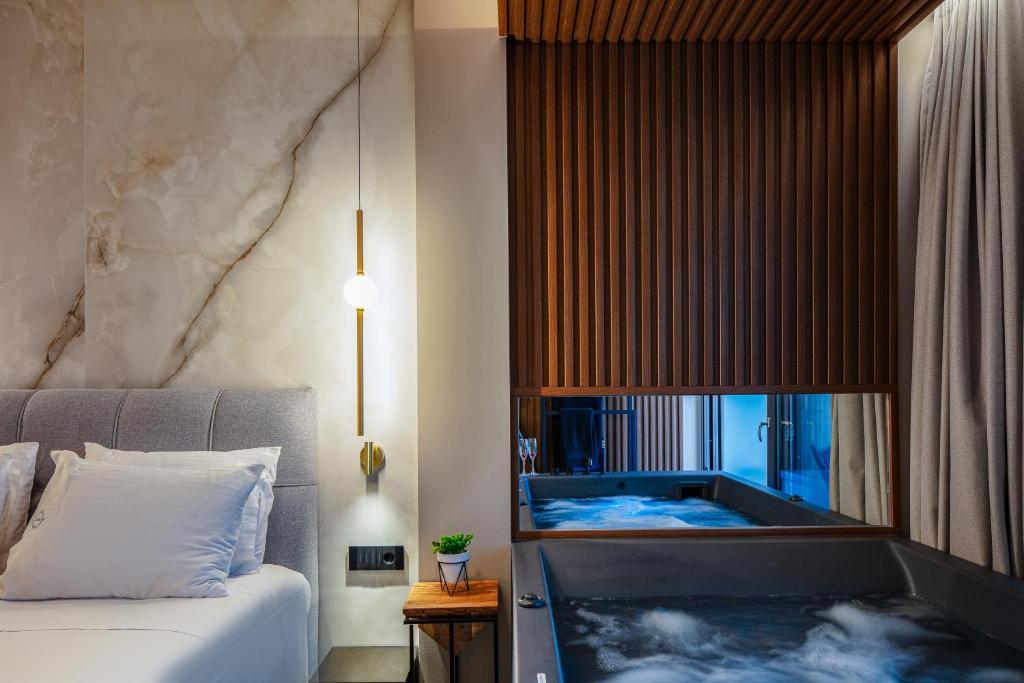 Posteľ alebo postele v izbe v ubytovaní La Vie En Mer Apartments