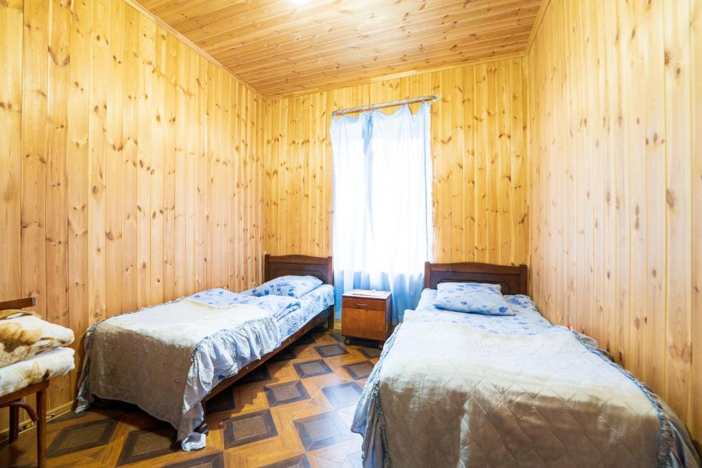 Postel nebo postele na pokoji v ubytování Guesthouse Svani
