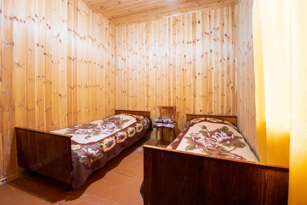 Postel nebo postele na pokoji v ubytování Guesthouse Svani