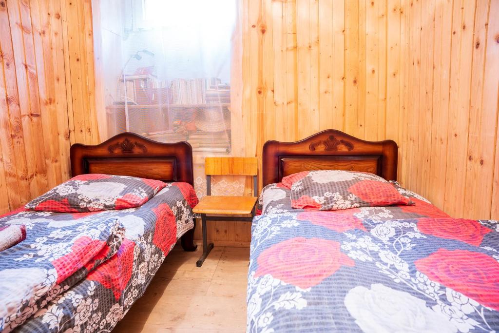 Postel nebo postele na pokoji v ubytování Guesthouse Svani