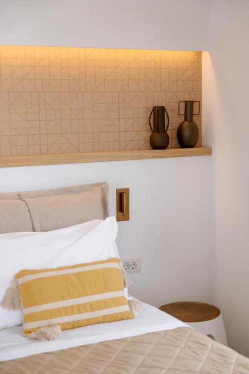 Letto o letti in una camera di Pnoi Hotel