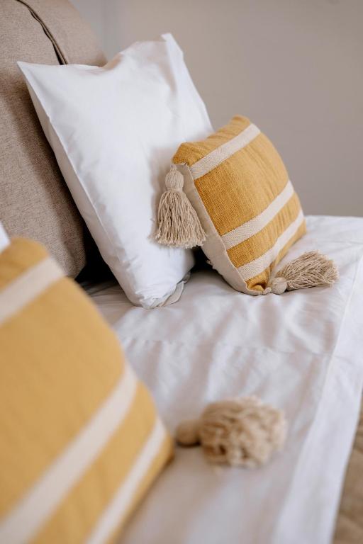 Letto o letti in una camera di Pnoi Hotel