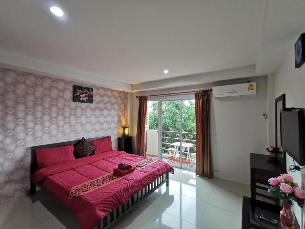Katil atau katil-katil dalam bilik di Tontalay Hotel