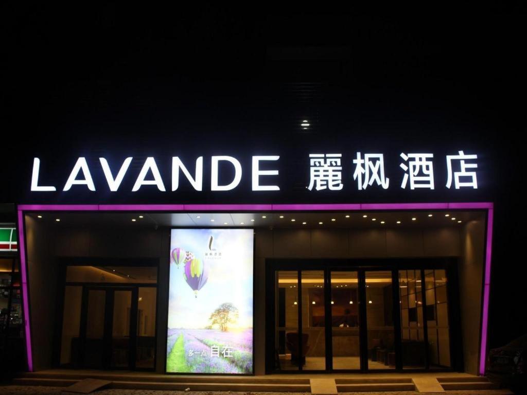 a building with a sign that readslevantide with avertisement at Lavande Hotel Tianjin Binhia Yujiabao Finance Center Branch in Binhai