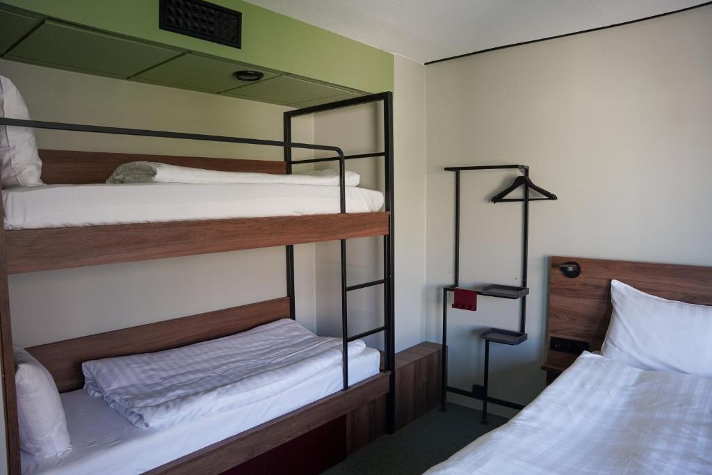 Postel nebo postele na pokoji v ubytování Comfort Hotel Panorama