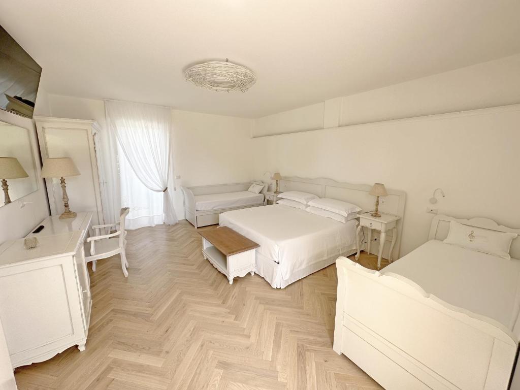 Postel nebo postele na pokoji v ubytování Adagio Salentino