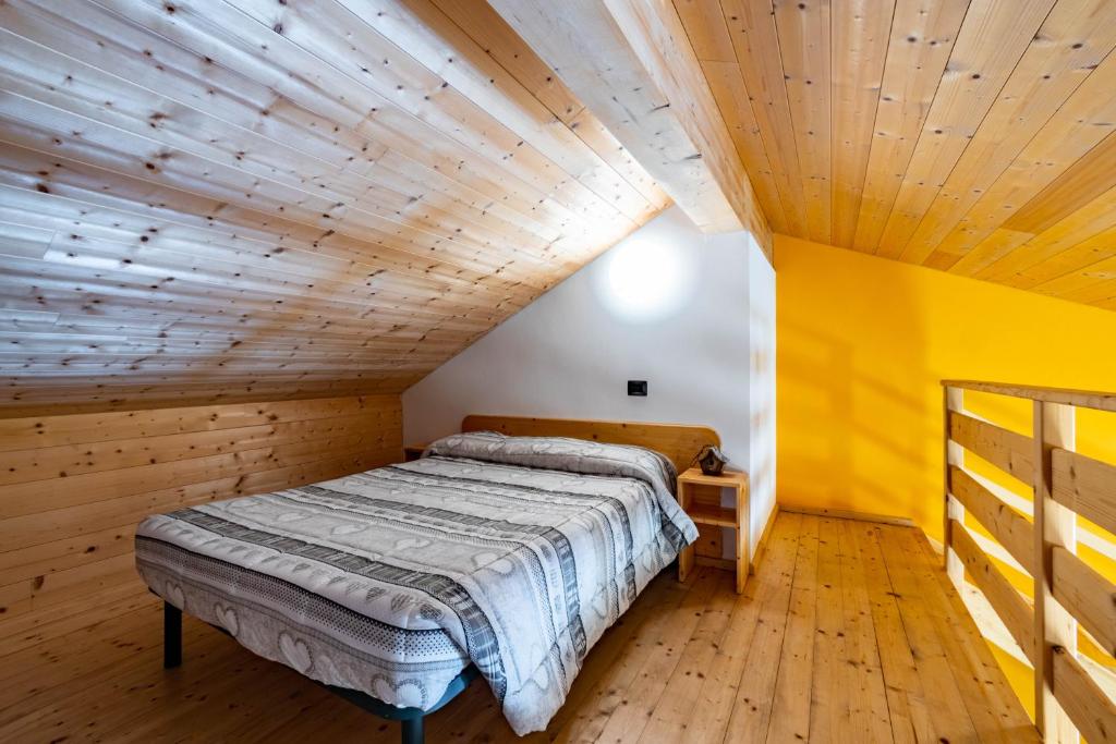 Posteľ alebo postele v izbe v ubytovaní Case Appartamenti Vacanze Da Cien
