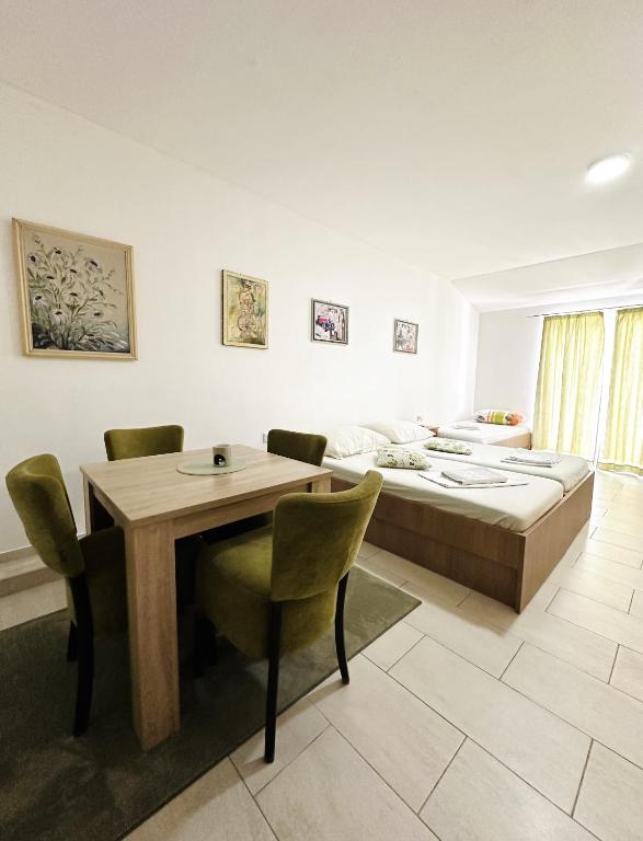 Postel nebo postele na pokoji v ubytování Apartments Mango