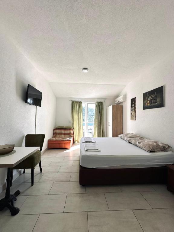 Postel nebo postele na pokoji v ubytování Apartments Mango