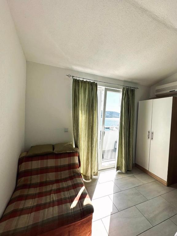 Postel nebo postele na pokoji v ubytování Apartments Mango