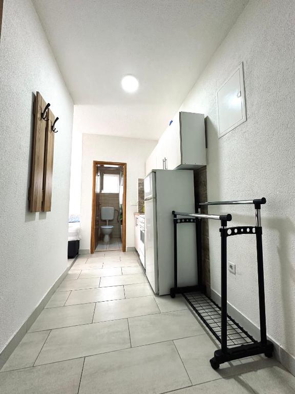 Kuchyň nebo kuchyňský kout v ubytování Apartments Mango