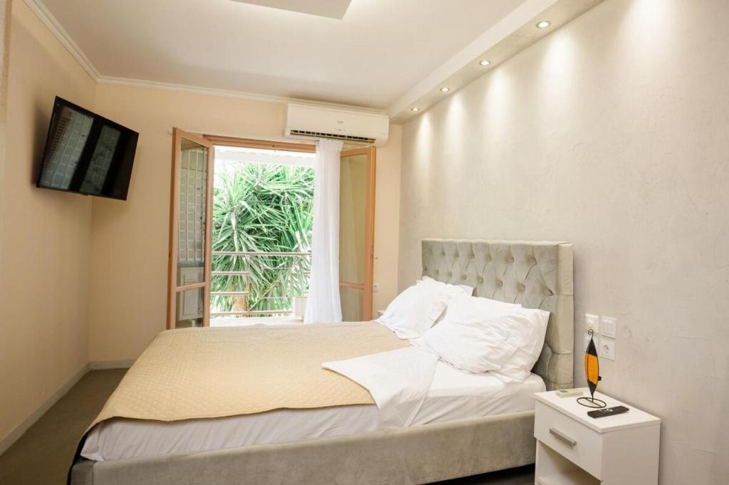 Postel nebo postele na pokoji v ubytování Velanidia Seaside Villa
