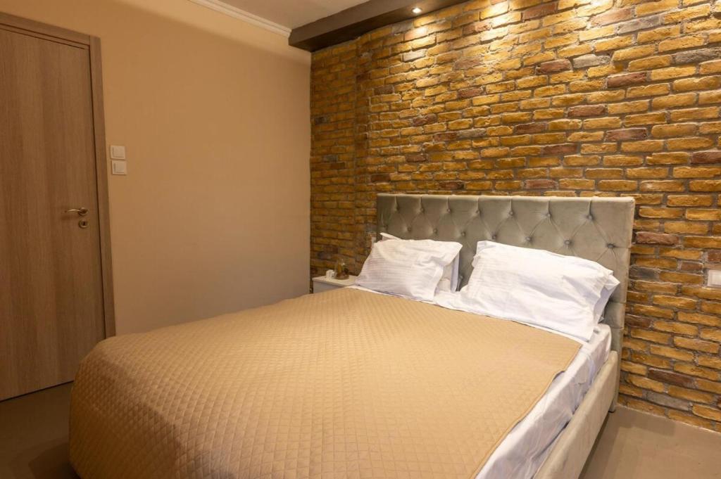 Postel nebo postele na pokoji v ubytování Velanidia Seaside Villa