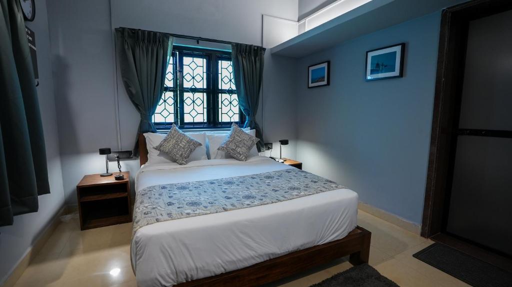 Postel nebo postele na pokoji v ubytování Sort By Stays, Grand Peddem, Anjuna
