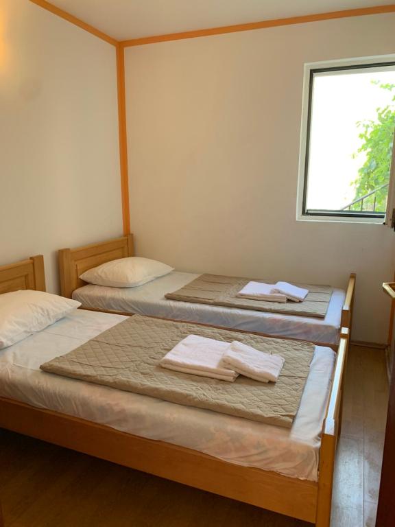 Postel nebo postele na pokoji v ubytování Villa Lila