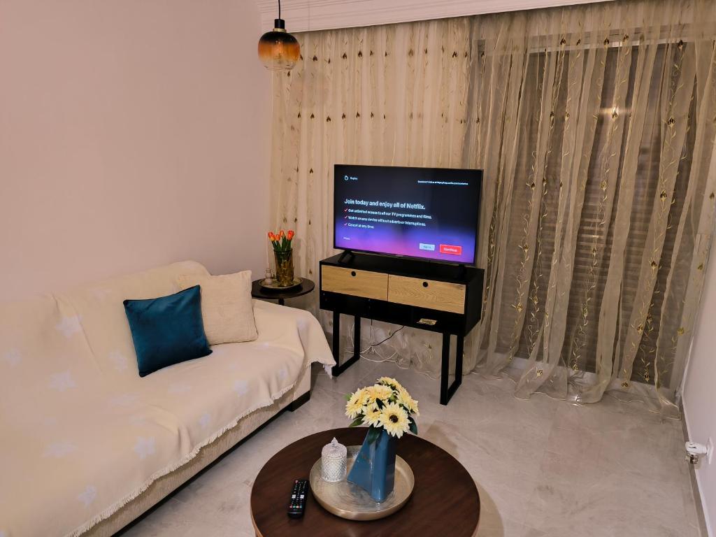 TV a/nebo společenská místnost v ubytování Tropico House