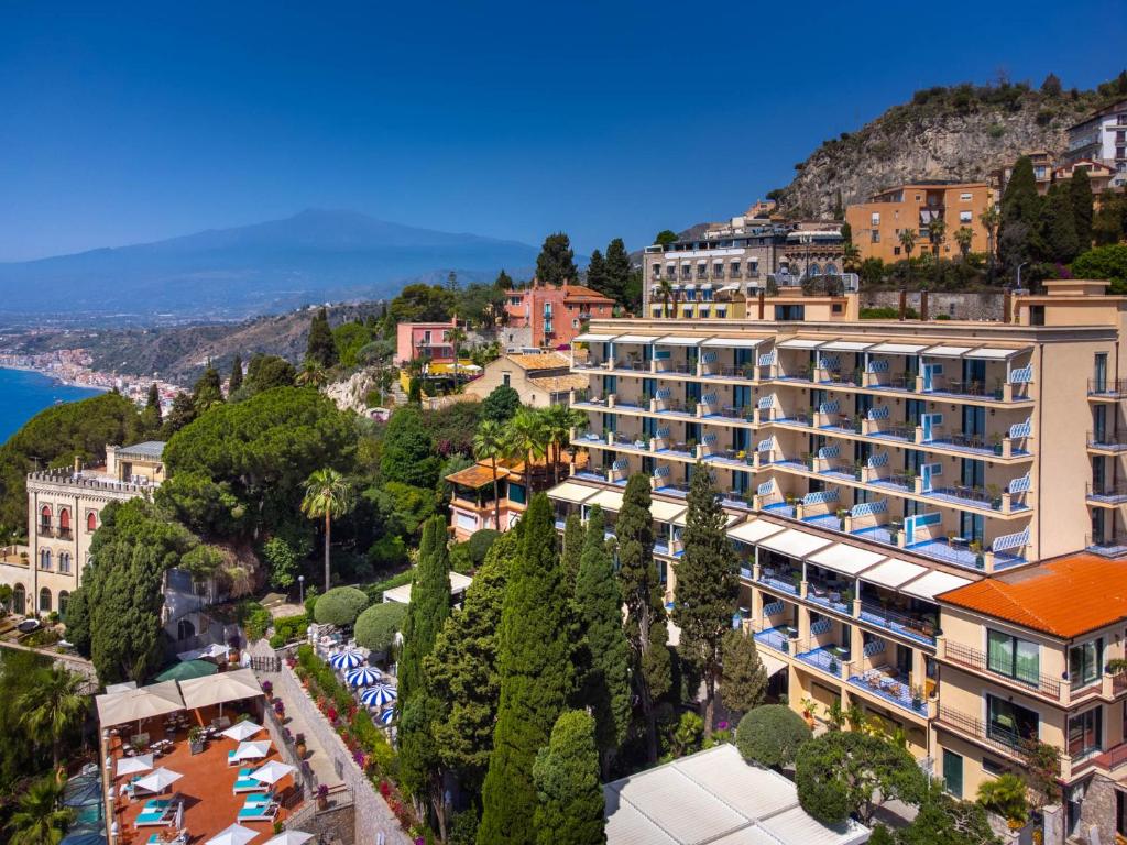 an aerial view of a resort on a hill at Grand Hotel San Pietro Taormina in Taormina