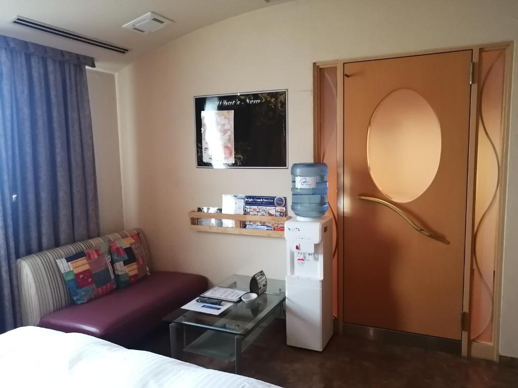 Postel nebo postele na pokoji v ubytování 月のあかり