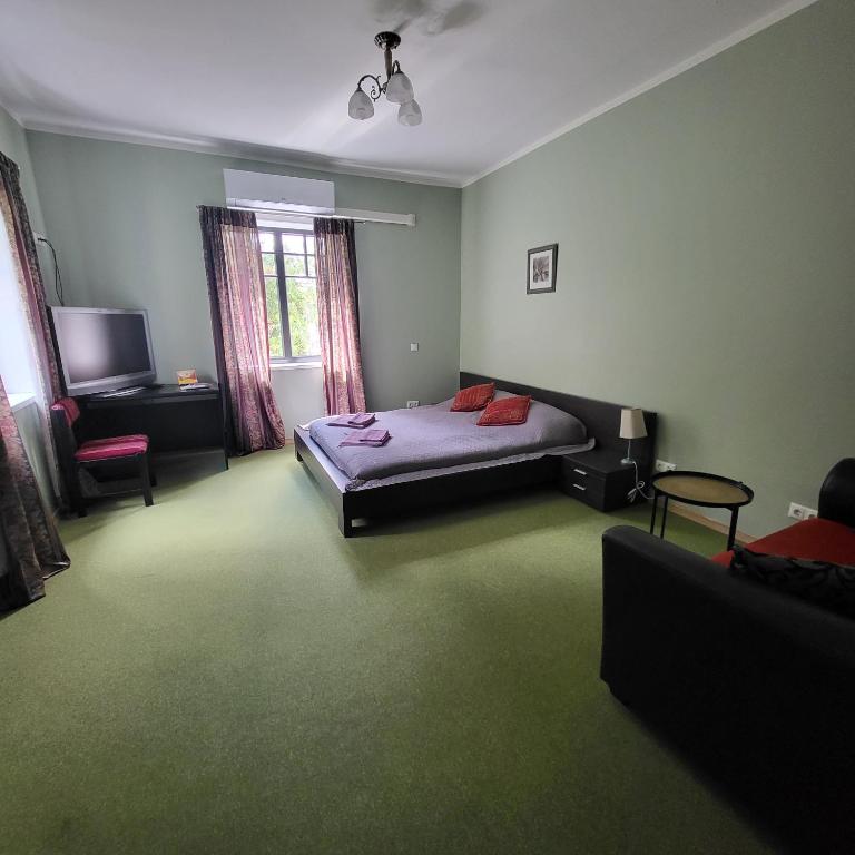 Postel nebo postele na pokoji v ubytování Goodwin Guest House
