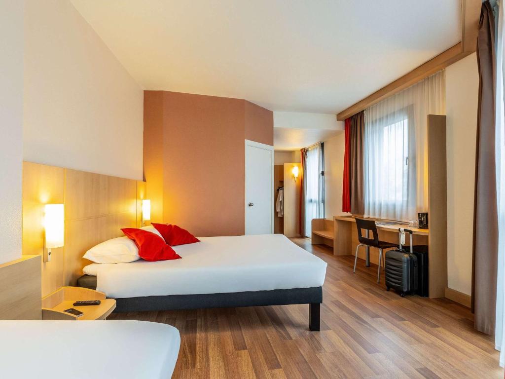 Postel nebo postele na pokoji v ubytování Ibis Bilbao Centro