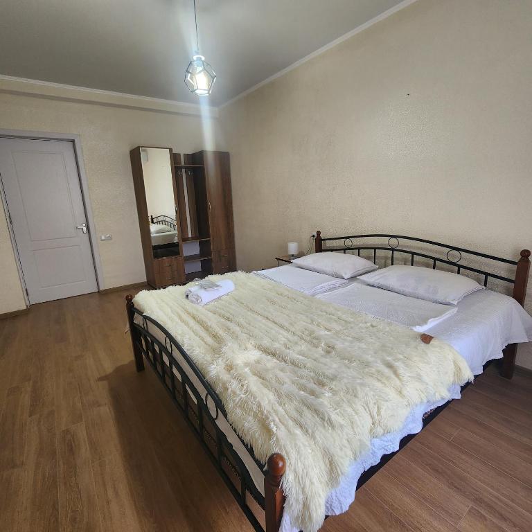 Postel nebo postele na pokoji v ubytování PANORAMA family hotel