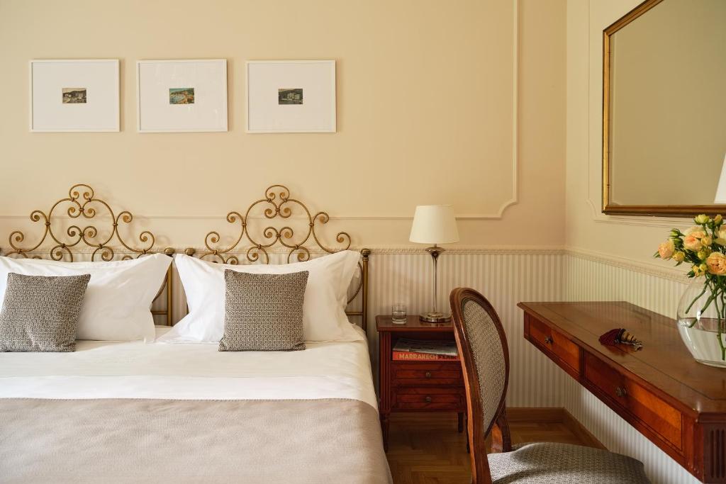 Кровать или кровати в номере Grand Hotel Miramare