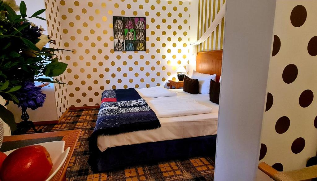 Postel nebo postele na pokoji v ubytování Hotel Schieferhof - GlasLUST