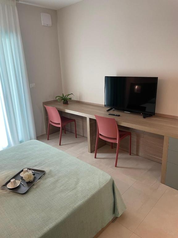 TV a/nebo společenská místnost v ubytování Villa Arlini