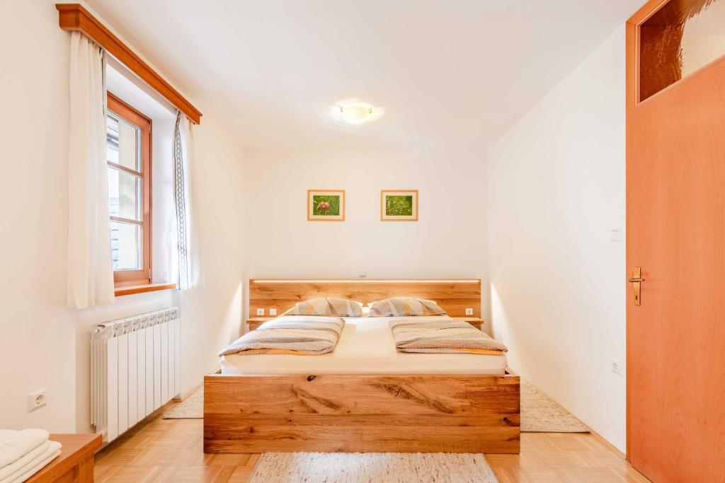 Postel nebo postele na pokoji v ubytování Apartma Miranda