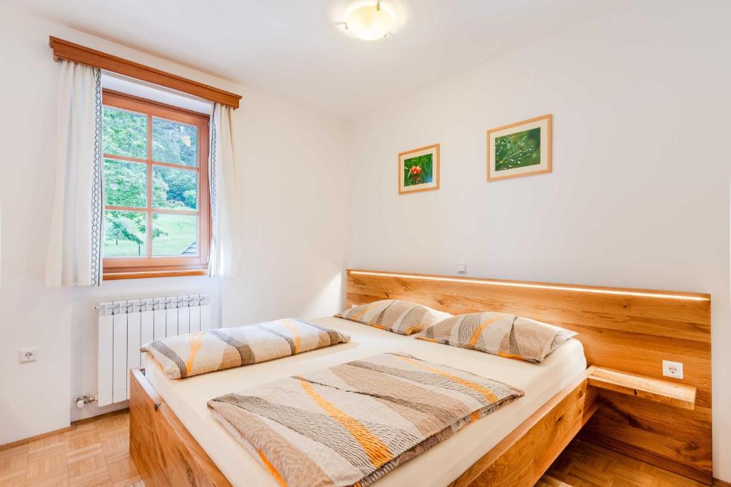 Postel nebo postele na pokoji v ubytování Apartma Miranda