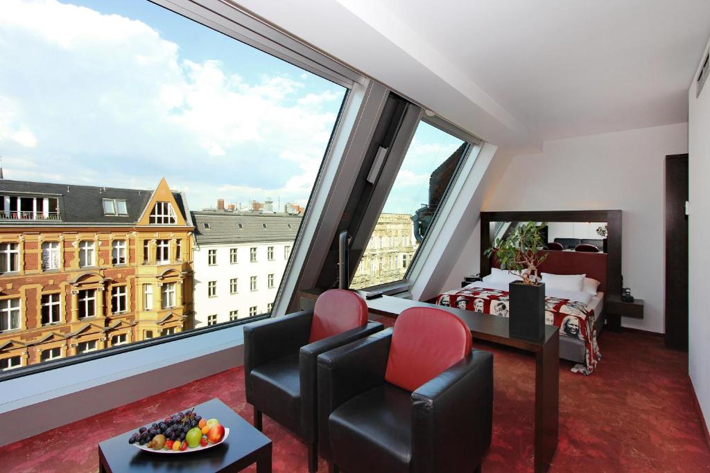 Postel nebo postele na pokoji v ubytování ARCOTEL Velvet Berlin