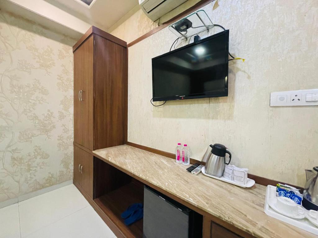 TV a/nebo společenská místnost v ubytování Hotel Kc Inn Ajmer