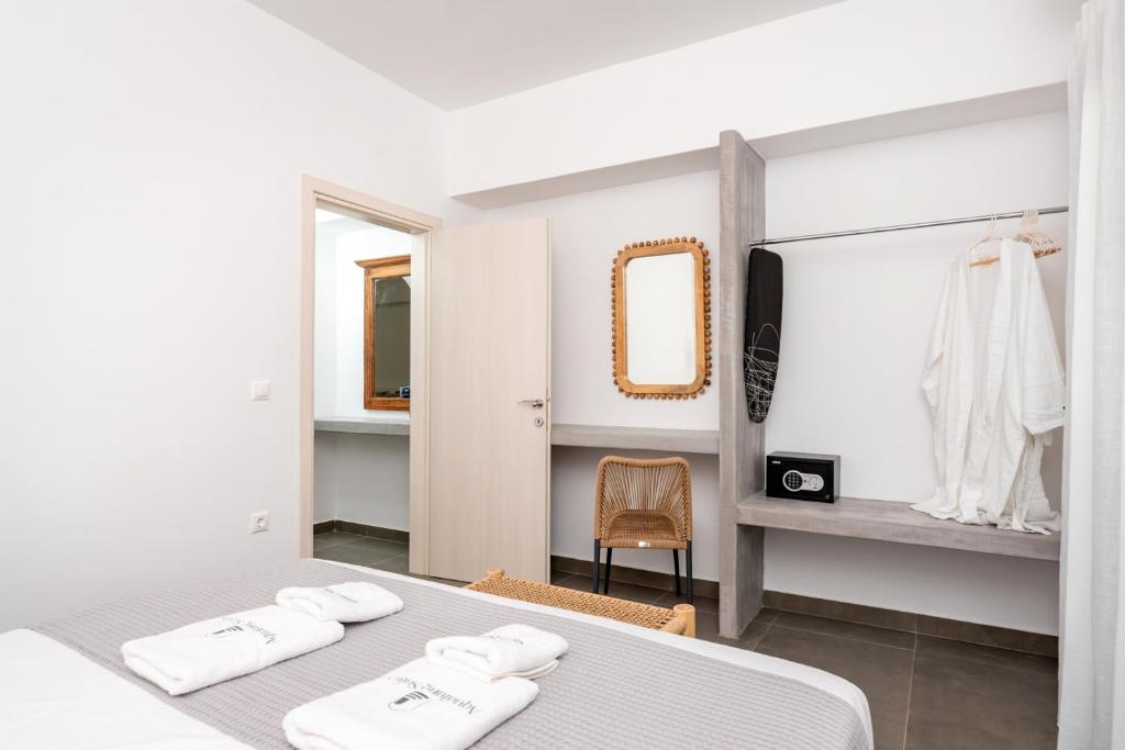 Postel nebo postele na pokoji v ubytování AquaLung Suites